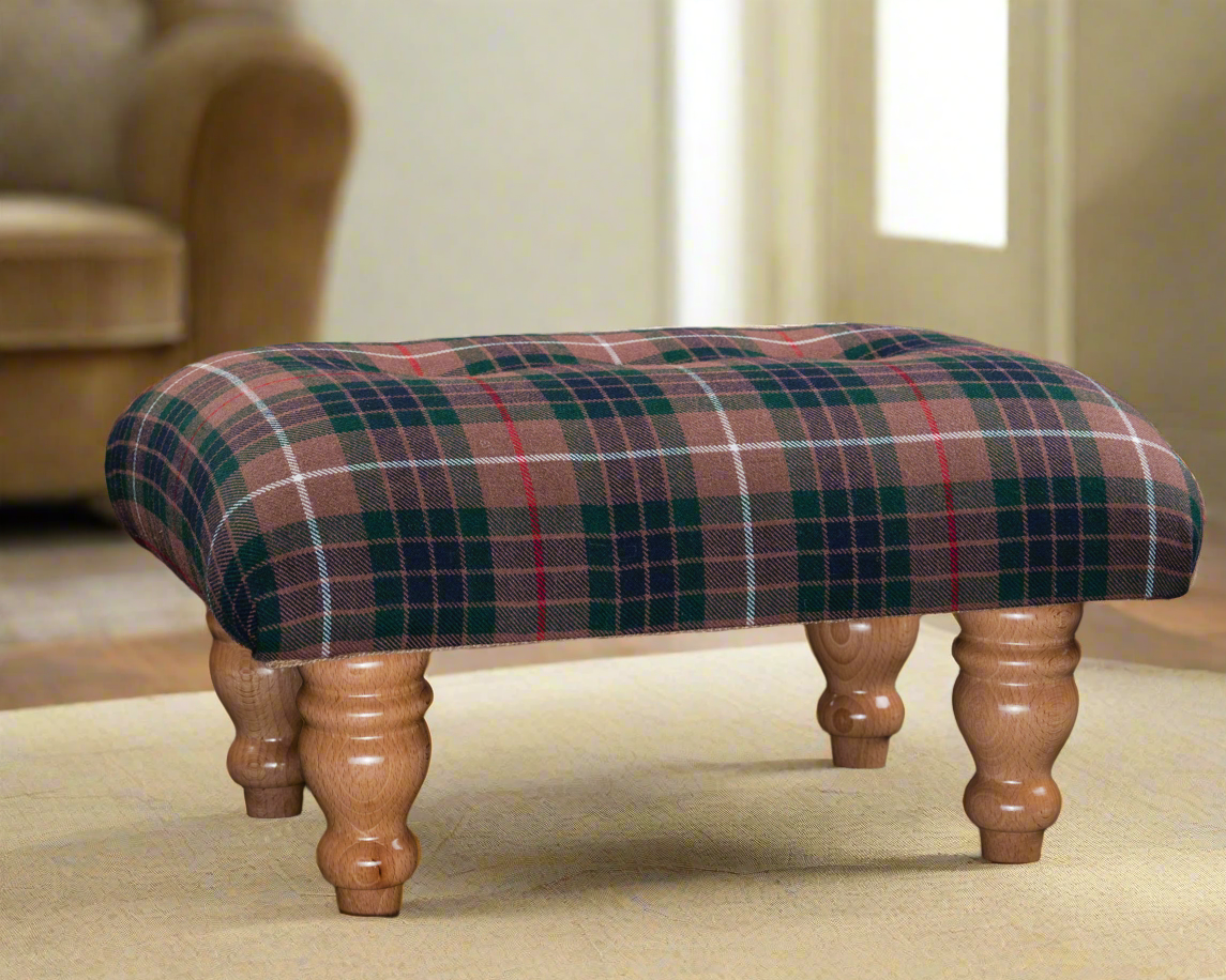 This footstool is a well-crafted, classic piece with strong Scottish heritage, perfect for customers seeking quality and tradition in their decor. The Fraser Hunting tartan and traditional feet make it a timeless choice.